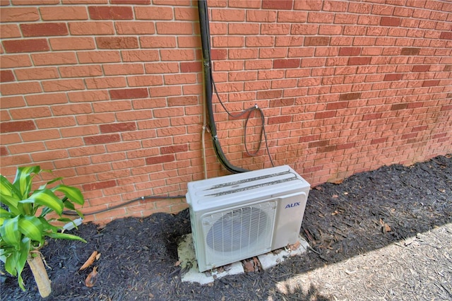 2814 Grapefruit Dr, Auburndale, FL 33823 - exterior view of an ac unit and brick siding