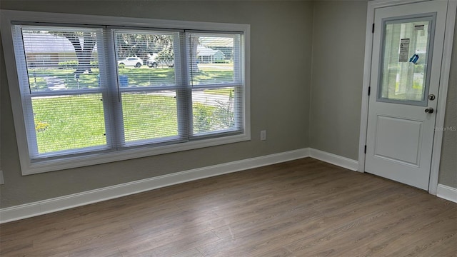 713 4th St NE, Fort Meade, FL 33841 - spare room with wood finished floors