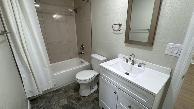 713 4th St NE, Fort Meade, FL 33841 - bathroom with a textured wall, shower / bathtub combination with curtain, vanity, and stone finish floors