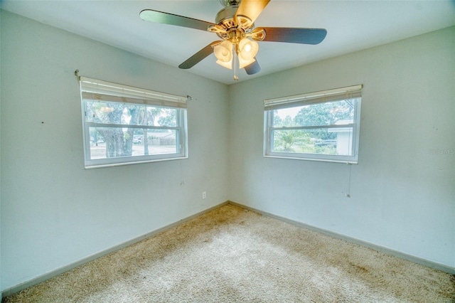 415 Boger Blvd N, Lakeland, FL 33803 - carpeted empty room featuring baseboards and a ceiling fan