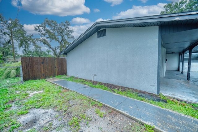 415 Boger Blvd N, Lakeland, FL 33803 - view of side of property with stucco siding
