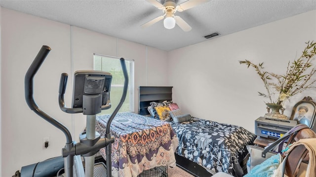 912 Whisper Lake Dr, Winter Haven, FL 33880 - carpeted bedroom with a textured ceiling and a ceiling fan