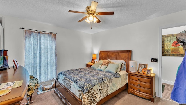 912 Whisper Lake Dr, Winter Haven, FL 33880 - carpeted bedroom with a textured ceiling and ceiling fan