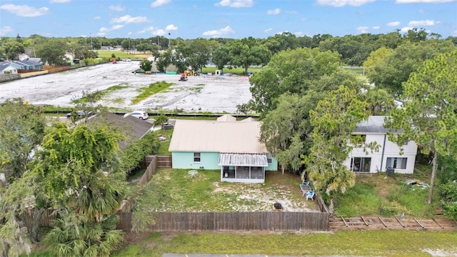 912 Whisper Lake Dr, Winter Haven, FL 33880 - aerial overview of property's location featuring a tree filled landscape