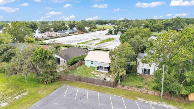 912 Whisper Lake Dr, Winter Haven, FL 33880 - aerial perspective of suburban area featuring a tree filled landscape