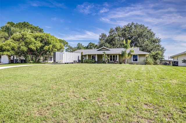 2056 Broken Arrow Trl N, Lakeland, FL 33813 - ranch-style house featuring a front lawn