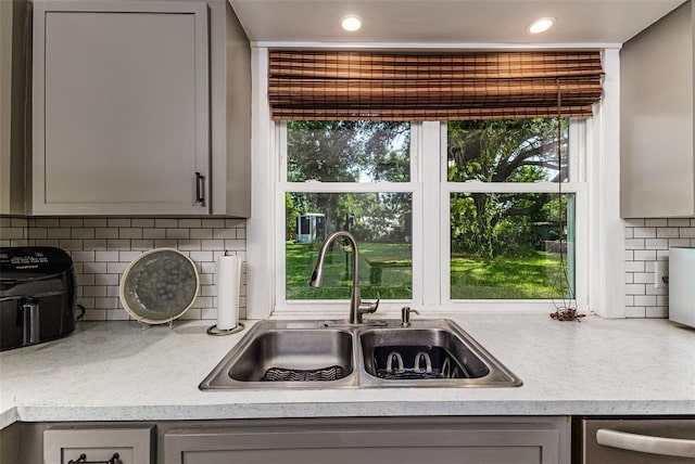 2056 Broken Arrow Trl N, Lakeland, FL 33813 - kitchen featuring gray cabinets, dishwasher, plenty of natural light, and recessed lighting