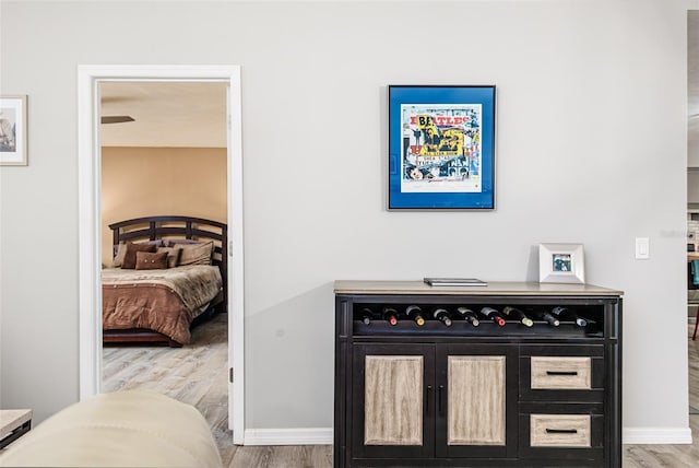 2056 Broken Arrow Trl N, Lakeland, FL 33813 - bedroom / living area view of wood finished floors and baseboards