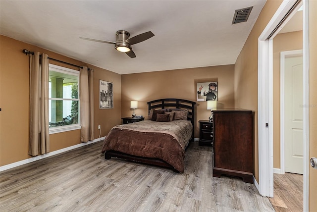 2056 Broken Arrow Trl N, Lakeland, FL 33813 - bedroom featuring wood finished floors and ceiling fan
