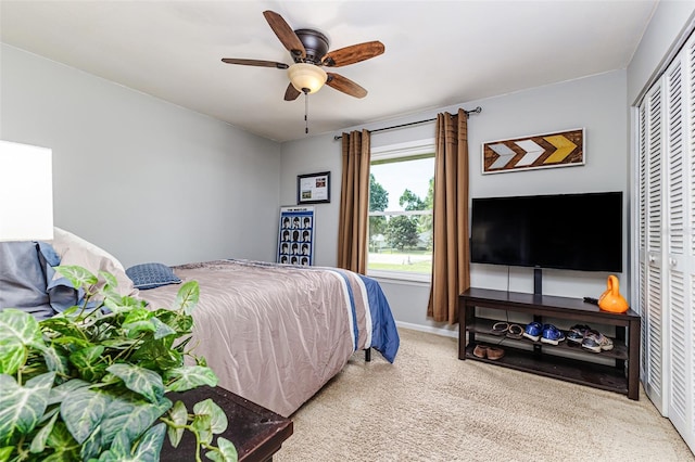 2056 Broken Arrow Trl N, Lakeland, FL 33813 - bedroom featuring carpet, a closet, and a ceiling fan