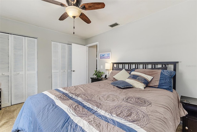 2056 Broken Arrow Trl N, Lakeland, FL 33813 - bedroom featuring multiple closets, carpet flooring, and ceiling fan