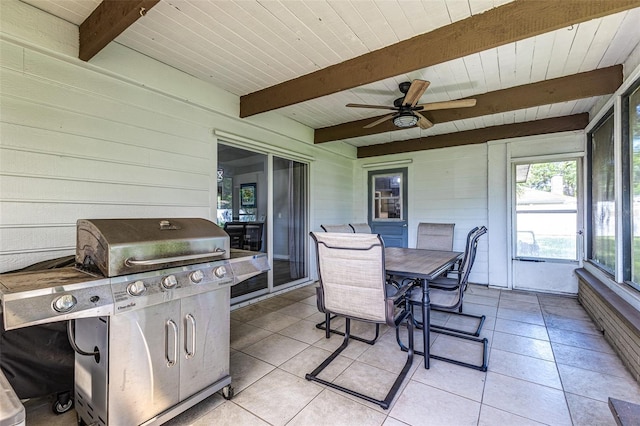 2056 Broken Arrow Trl N, Lakeland, FL 33813 - sunroom / solarium featuring a ceiling fan, beam ceiling, and outdoor dining area