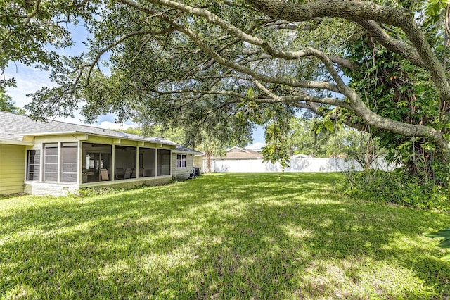 2056 Broken Arrow Trl N, Lakeland, FL 33813 - view of yard featuring a sunroom