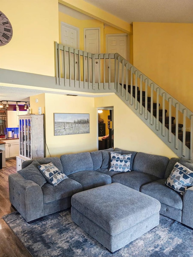985 Whisper Lk, Winter Haven, FL 33880 - living room featuring wood finished floors and stairs