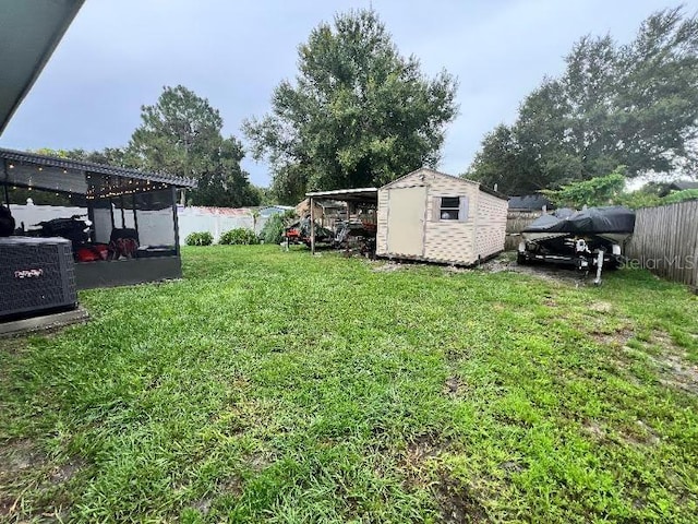 985 Whisper Lk, Winter Haven, FL 33880 - fenced backyard with a storage shed
