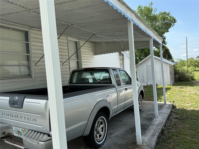 724 Ave D SW, Winter Haven, FL 33880 - view of car parking with a shed and a carport
