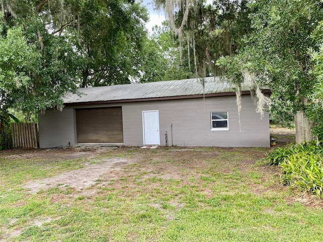 view of property exterior with a yard