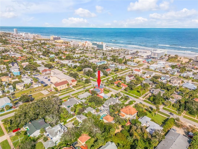 aerial view with a beach view and a water view