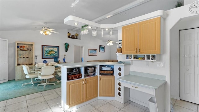 kitchen with light tile flooring, light brown cabinetry, ceiling fan, and lofted ceiling with beams