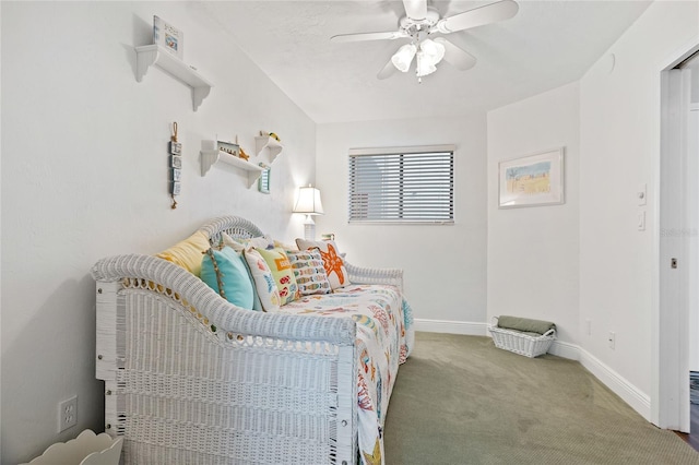 bedroom with dark carpet and ceiling fan