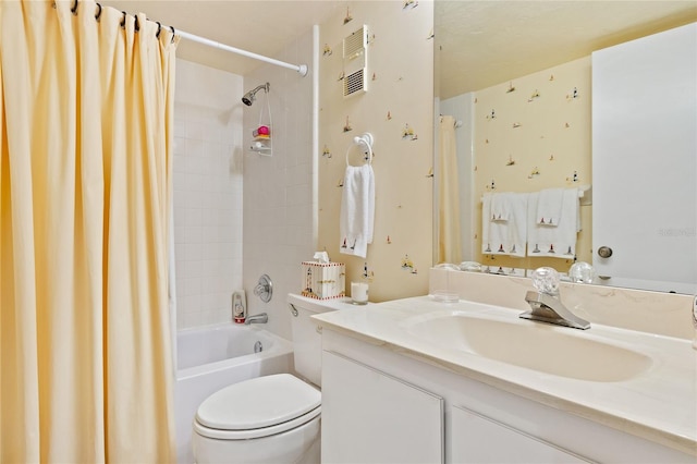 full bathroom featuring vanity, toilet, and shower / bath combination with curtain