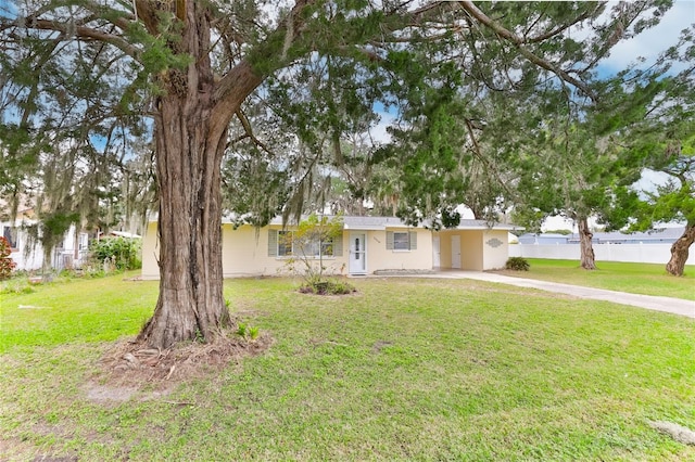 view of front of home with a front lawn