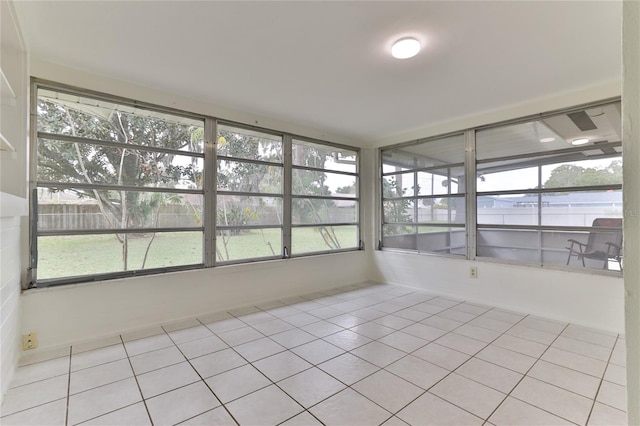 unfurnished sunroom with a wealth of natural light