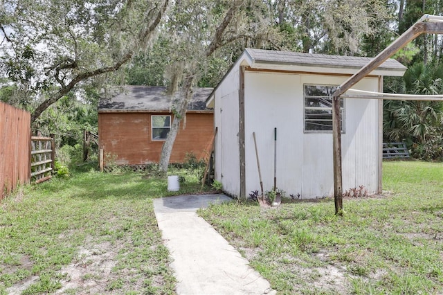 view of shed / structure featuring a yard