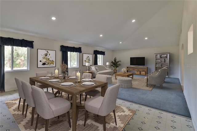 dining area featuring light tile flooring