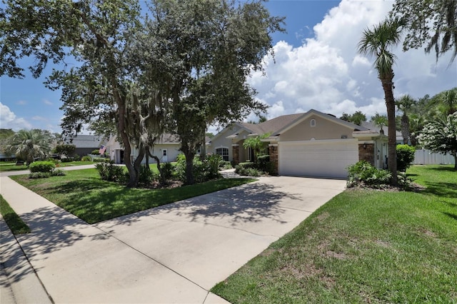 view of front of house featuring a front yard and a garage