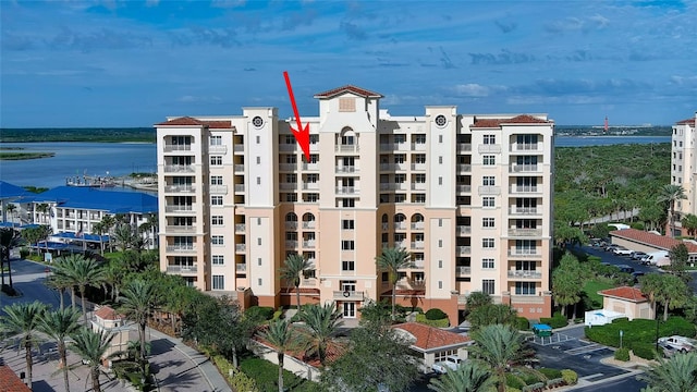 view of property with a water view