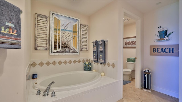 263 Minorca Beach Way Unit 803, New Smyrna Beach, FL 32169 - bathroom with tile floors, toilet, and tiled tub