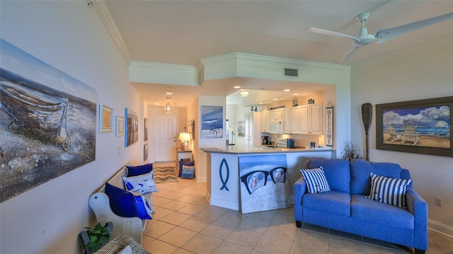 263 Minorca Beach Way Unit 803, New Smyrna Beach, FL 32169 - tiled living room featuring ornamental molding and ceiling fan