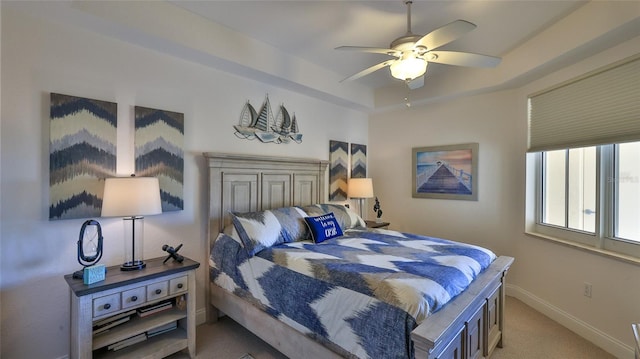 263 Minorca Beach Way Unit 803, New Smyrna Beach, FL 32169 - bedroom with carpet, a tray ceiling, and ceiling fan