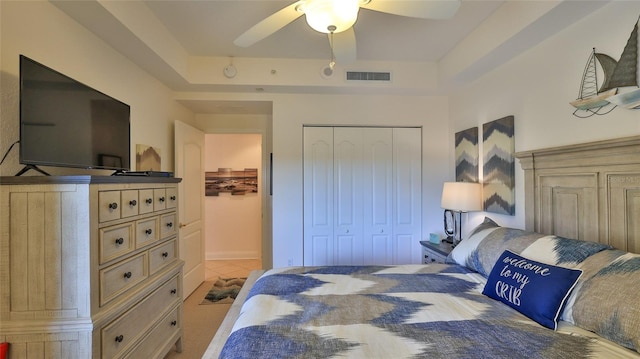 263 Minorca Beach Way Unit 803, New Smyrna Beach, FL 32169 - tiled bedroom with a closet, ceiling fan, and a tray ceiling
