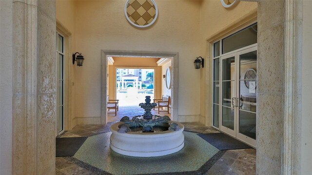 263 Minorca Beach Way Unit 803, New Smyrna Beach, FL 32169 - interior space featuring dark tile floors and french doors