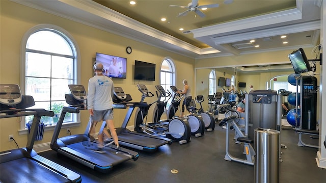 263 Minorca Beach Way Unit 803, New Smyrna Beach, FL 32169 - workout area featuring ornamental molding, ceiling fan, and a tray ceiling