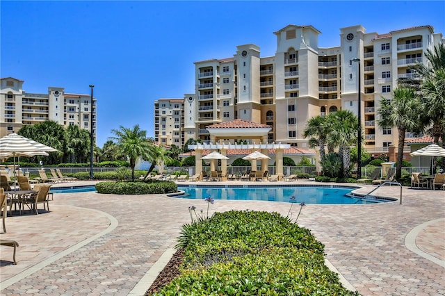 263 Minorca Beach Way Unit 803, New Smyrna Beach, FL 32169 - view of swimming pool with a patio area