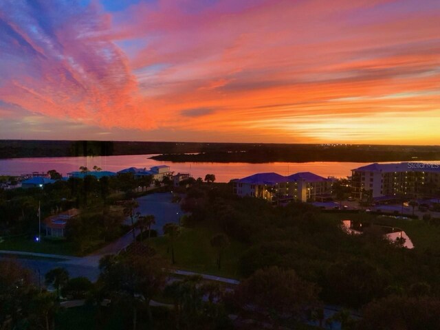263 Minorca Beach Way Unit 803, New Smyrna Beach, FL 32169 - aerial view at dusk featuring a water view