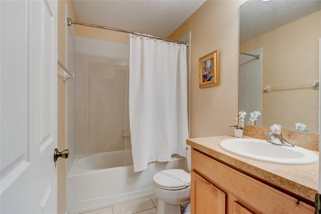 full bathroom featuring vanity, a textured ceiling, tile flooring, toilet, and shower / tub combo