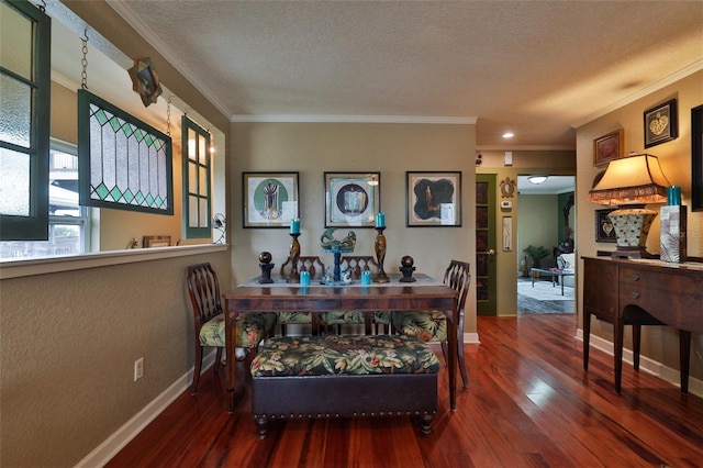 dining area featuring a textured ceiling, dark hardwood / wood-style flooring, and ornamental molding