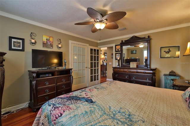 bedroom with french doors, ornamental molding, dark hardwood / wood-style flooring, and ceiling fan