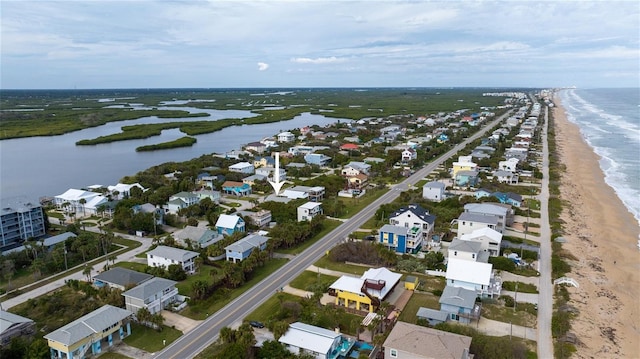 aerial view with a beach view and a water view