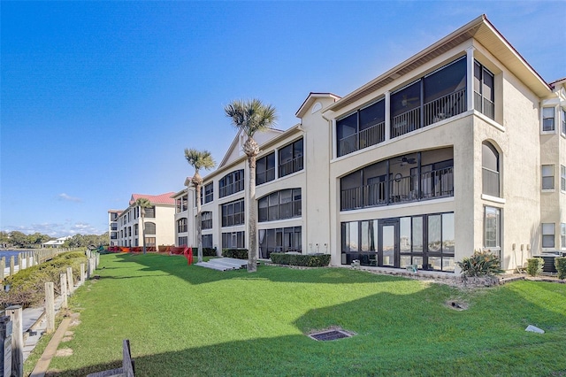 view of property featuring central AC unit