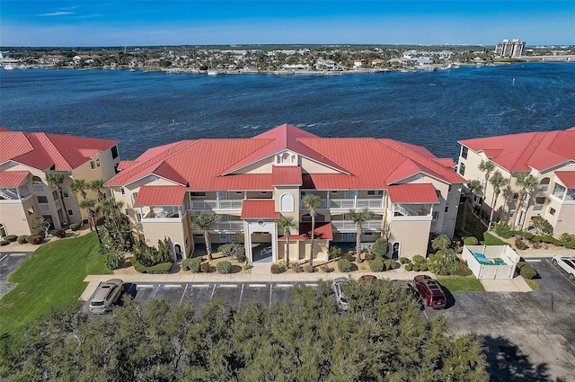 birds eye view of property featuring a water view