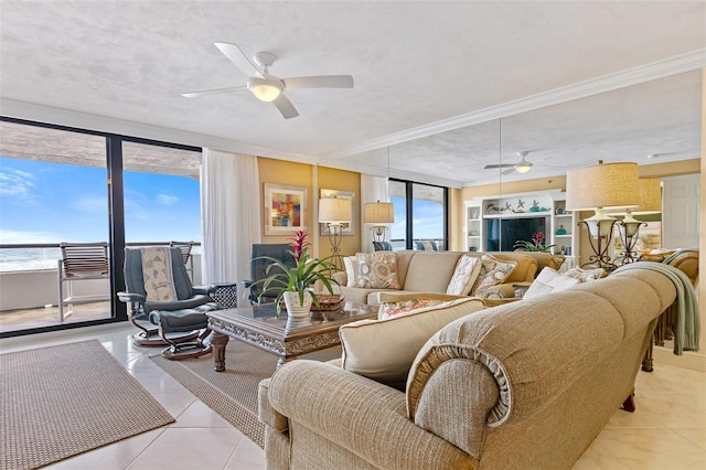 tiled living room featuring floor to ceiling windows, crown molding, a textured ceiling, and ceiling fan