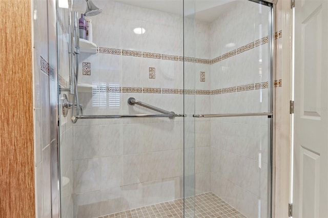 bathroom featuring an enclosed shower