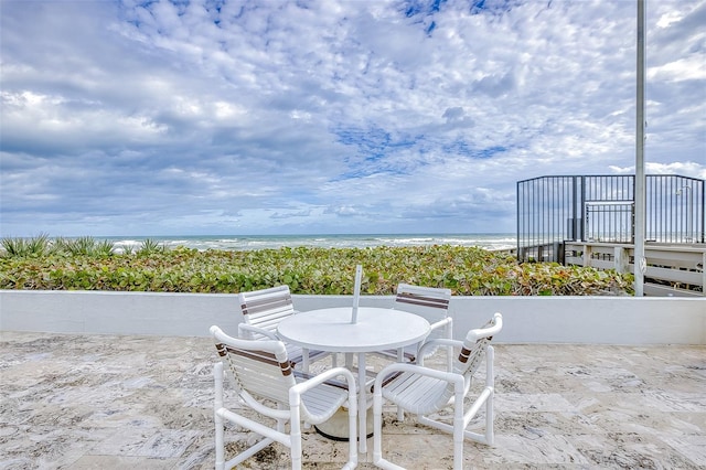 view of patio / terrace featuring a water view
