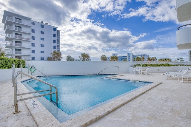 view of pool with a patio area