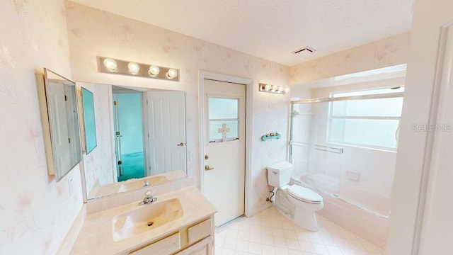 full bathroom with toilet, shower / bath combination with glass door, a textured ceiling, vanity, and tile floors